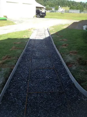 Orford, NH Stamped Concrete Pathway — Stone & Concrete Installation project by Maple Creek Landworks LLC