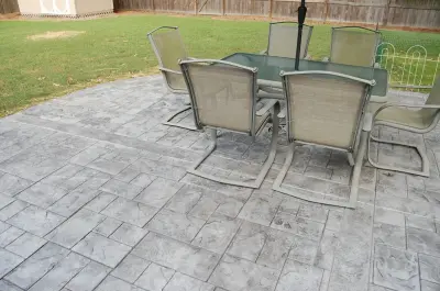 Ashlar Slate Stamped Patio — Stone & Concrete Installation project by Warrick Concrete Services, Inc.