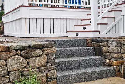 Pathway to Deck: Woodbury Gray Split Face Steps, New England Inspired Wallstone — Stone & Concrete Installation project by Swenson Granite Works