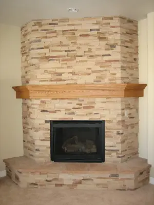 Rock Fireplaces — Stone & Concrete Installation project by Innovative Stoneworks & Landscaping