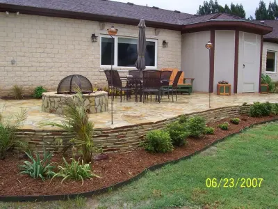 Rocky Outdoor Spaces and Grilling Areas — Stone & Concrete Installation project by Bervi Natural Stone