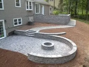 Cheshire, CT Stone Patios, Walkways, Steps, and Integrated Fireplace — Stone & Concrete Installation project by F.K. Masonry