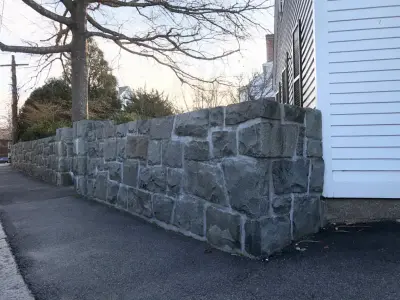 Reconstruction of Stone Wall — Stone & Concrete Installation project by Hefel Masonry LLC
