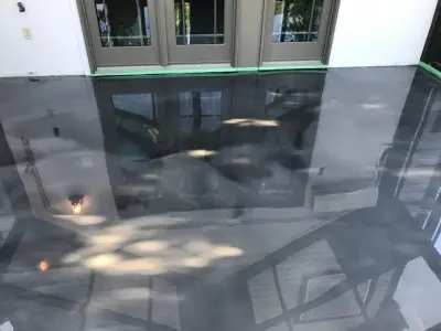 Titanium Metallic Epoxy Flooring for Sun Room — Stone & Concrete Installation project by The Concrete Guy By Matthew Hage