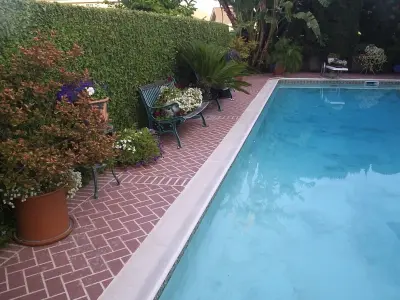Sym Surfaces for Driveways, Pools, and Patios — Stone & Concrete Installation project by Dave Pratt Designs And Consulting