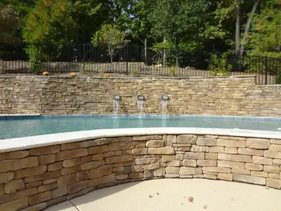 Tapawingo Pool, dry-stacked stone walls — Stone & Concrete Installation project by Masterpiece Masonry
