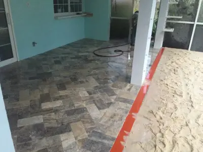 Clearwater Travertine Pool Deck — Stone & Concrete Installation project by JR Pavers Inc.