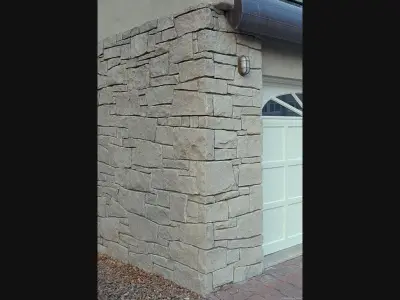 Gray Stone Veneer in Tuxedo Style — Stone & Concrete Installation project by Native Stone Co