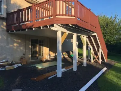Deck Below Drainage — Stone & Concrete Installation project by Hardscape Artists LLC