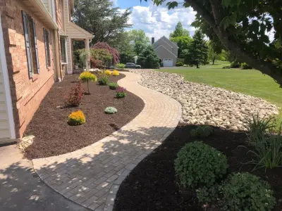 Pathway with River Stones — Stone & Concrete Installation project by Hardscape Artists LLC