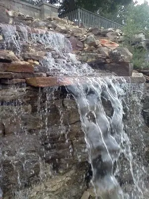 Waterfront Design and Pool Elements — Stone & Concrete Installation project by Nature's Touch