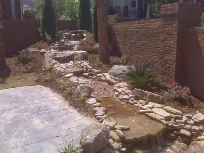 aquatic elements — Stone & Concrete Installation project by Backyard Outfitters