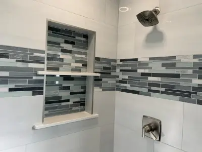 Primary Bathroom Remodel by Benchmark Renovations