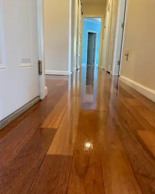 Brazilian Cherry Hardwood Refinishing - Natural Wood Stain Color — Flooring Installation Services project by Floors By VAL