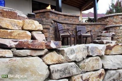 Rustic Pool With Hot Tub And Natural Landscaping by Big Rock Landscaping