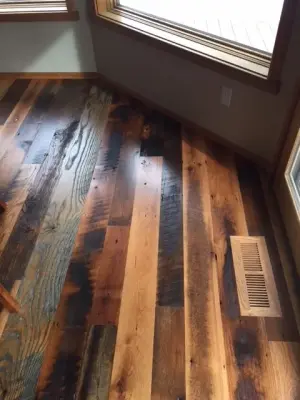 repurposed wood flooring from reclaimed fence posts — Flooring Installation Services project by J&J Hardwood Floors