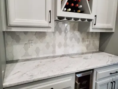 Ornamental Backsplash Setup — Flooring Installation Services project by Benchmark Renovations