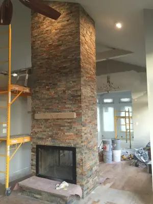 Fireplace Projects with Stone and Travertine — Flooring Installation Services project by D&D Floor Covering Inc