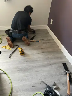 Vinyl Flooring Installation and Kitchen Tile Removal with New Tile Installation — Flooring Installation Services project by Floors By VAL