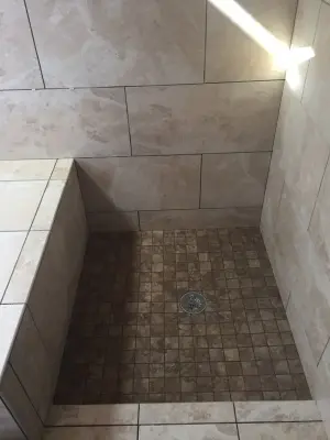 Bathroom Renovation with Marble Tile — Flooring Installation Services project by Merkel Tile