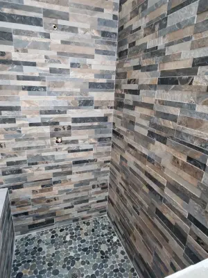 Updated Bathroom Tile — Flooring Installation Services project by Footprints Floors | McKinney