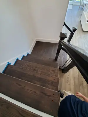 Updated Staircase — Flooring Installation Services project by Footprints Floors | McKinney