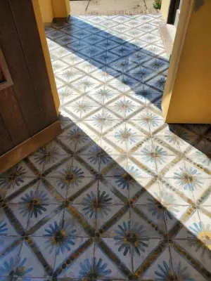 Exterior Patio Tile Setup — Flooring Installation Services project by Benchmark Renovations