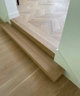 Premium Wood Flooring — Flooring Installation Services project by Alpine Flooring And Design
