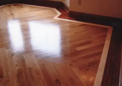Clayton, MO Red Oak Hardwood with Cherry Trim — Flooring Installation Services project by Gateway Flooring