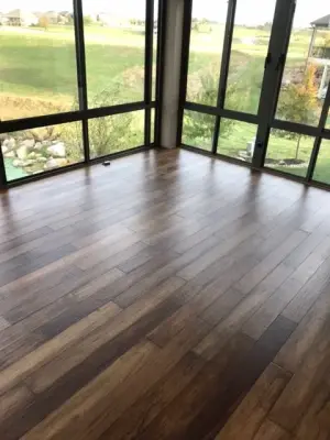 Waterford Estates Sun Room Hardwood Flooring — Flooring Installation Services project by EMO Flooring