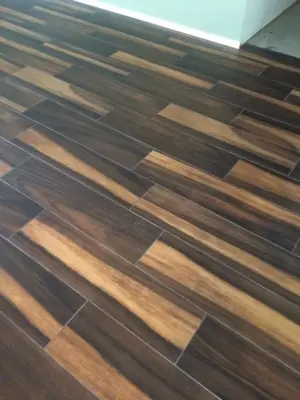 Wood-Look Tile Flooring — Flooring Installation Services project by D&D Floor Covering Inc
