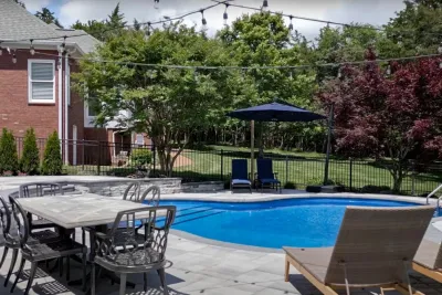 Pool Oasis with Hardscaping Features | Nashville, TN — Landscape Construction project by Gardens Of Babylon Landscapes in Nashville