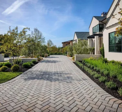 A Herringbone Welcome Home by DPG Pavers And Design