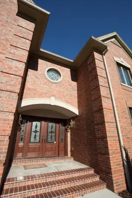 McNicholl Residence (new build/brick facade with cast stone accents) — Architectural & Building Design Services project by Russell Architects