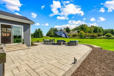 ADJACENT GOLF COURSE GETAWAY — Landscape Construction project by Eco Harmony Landscape & Design, LLC.