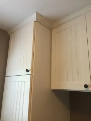 Laundry and Mudroom with Beadboard Design — Professional Home Organizers project by Jessica Earley