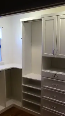 Efficiently Designed White Walk-in Space by Closet Solutions