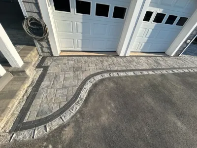 Amity Harbor | Expanded Driveway With Nicolock Stone Ridge Pavers by Joseph Matthew Landscape Inc Design & Build