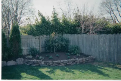 Rock Wall and small planting — Landscape Construction project by Joseph Matthew Landscape Inc Design & Build in Syosset