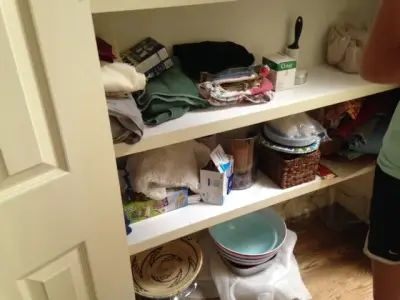 Storage Space in the Hallway — Professional Home Organizers project by Synchronized Spaces