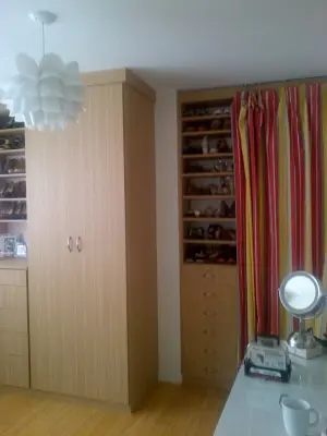 Stylish and Unique Integrated Closet for a Hollywood Apartment — Professional Home Organizers project by Closet Solutions