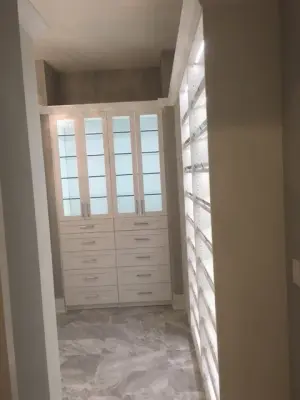 Monnier Wardrobe — Professional Home Organizers project by The Tailored Closet And PremierGarage