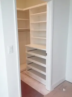 Compact Walk-in Closet for New Build — Professional Home Organizers project by Closet Solutions