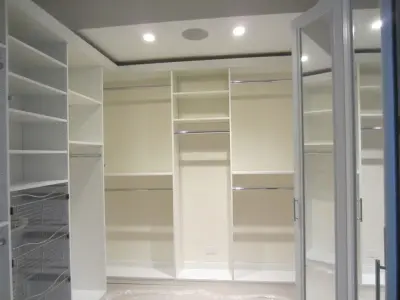 White Walk-In Wardrobe — Professional Home Organizers project by Denise Butchko/Butchko And Company