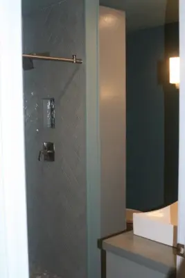 Modern Coastal Bathroom Renovation — Architectural & Building Design Services project by Lace Designs