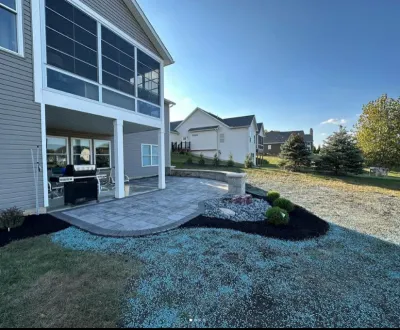 Custom Circular Patio with Fire Pit — Landscape Construction project by Lawns R Us Landscaping LLC
