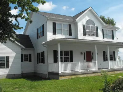 Ivory Two-Story Residence — Architectural & Building Design Services project by Elm Town Design, LLC.
