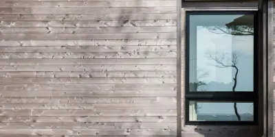 Contemporary warmth by the water — Architectural & Building Design Services project by David D. Quillin Architecture