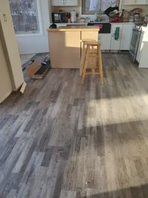 Vinyl Flooring Installation — Air Duct Cleaning Services project by Top Choice Remodeling