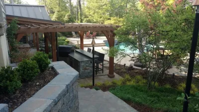Covered Outdoor Kitchen — Landscape Construction project by Vintage Landscaping